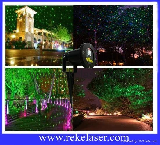 Red and green stationary firefly outdoor laser light for garden and trees
