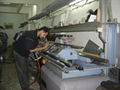 Flat knitting machines