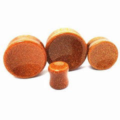 Concave double flared stone plugs