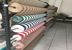 Polyester yarn for Oxford yarn-dyed fabric