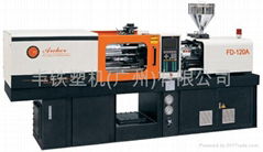 Direct hydaraulic injection molding machine