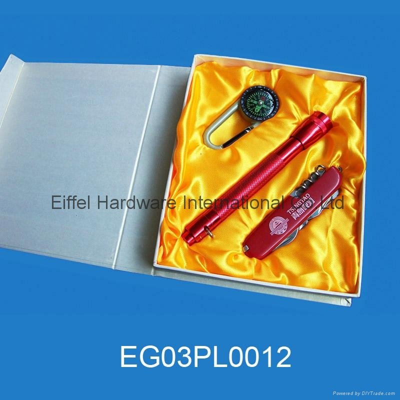 Promotional gift in paper box ( Multi knife , torch and compass)