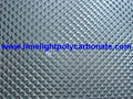 Prismatic polycarbonate sheet embossed