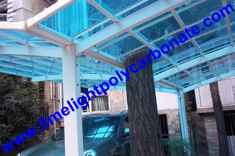 Double aluminium carport with white frame and blue polycarbonate solid roofing 4