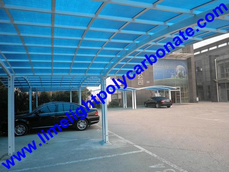 Double aluminium carport with white frame and blue polycarbonate solid roofing 5