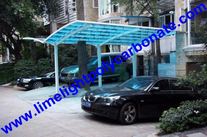 Double aluminium carport with white frame and blue polycarbonate solid roofing 3