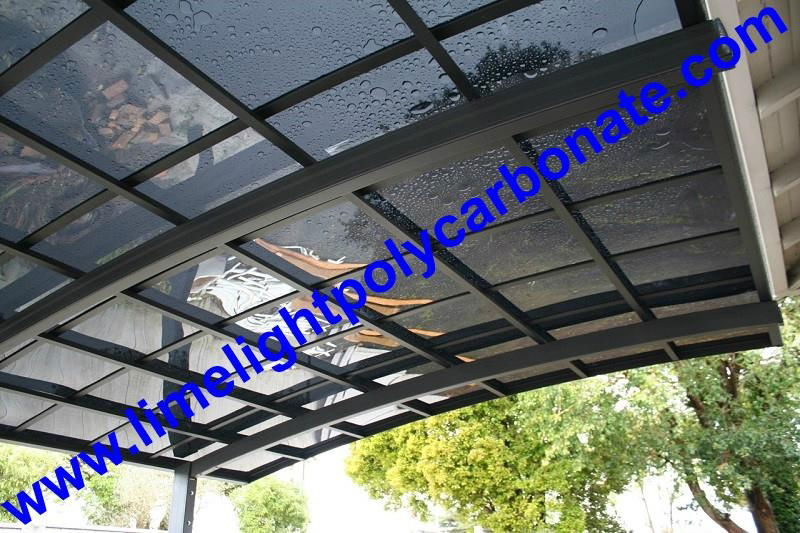 customized aluminium carport with grey frame and dark grey polycarbonate roofing 3