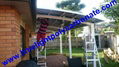 Double aluminium carport with white frame and blue polycarbonate solid roofing 14