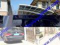 Double aluminium carport with white frame and blue polycarbonate solid roofing