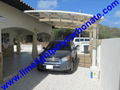 Double aluminium carport with white frame and blue polycarbonate solid roofing