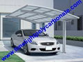 single aluminium awning with white frame and bronze polycarbonate solid roofing